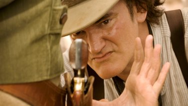 Quentin Tarantino directing a scene in <i>Django Unchained</i>.
