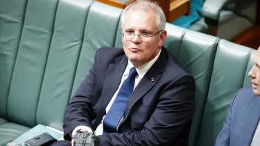 Treasurer Scott Morrison used a piece of a coal as a prop in federal Parliament on February 9.