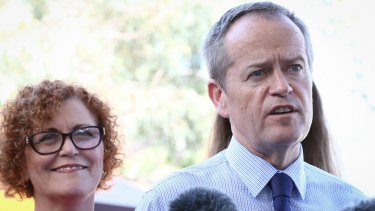 Opposition Leader Bill Shorten with ALP candidate for Herbert, Cathy O'Toole, during a visit to the Heatley State School in Townsville.