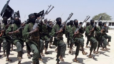 Al-Shabab fighters perform outside of Mogadishu in 2011.
