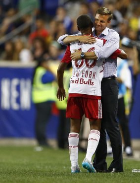 Job well done: New York Red Bulls defender Tyler Adams is hugged by manager Jesse Marsch after scoring against Chelsea FC.
