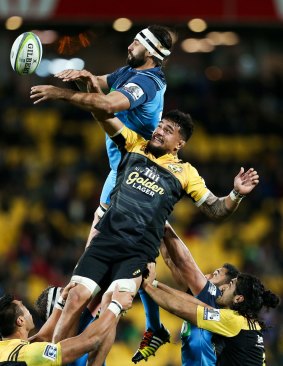 High jump: Hoani Matenga of the Blues and Vaea Fifita of the Hurricanes compete for a lineout.