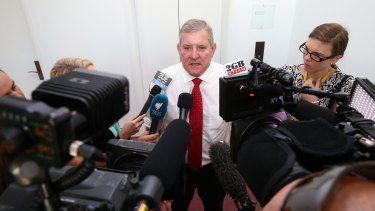 Industry Minister Ian Macfarlane addresses the media after an interview in Canberra on Sunday.
