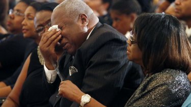 A mourner cries at the funeral of blues legend BB King. 