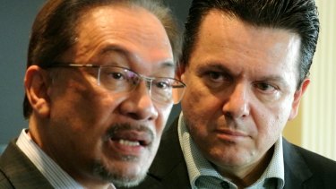 Malaysian opposition leader Anwar Ibrahim and independent Australian Senator Nick Xenophon discuss Mr Anwar's then imminent imprisonment in 2014.