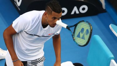 Kyrgios throws his racquet during his second-round loss to Andreas Seppi in Melbourne on Wednesday.