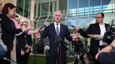 Communications Minister Malcolm Turnbull arrives to address the media and announce that he is challenging Prime Minister Tony Abbott for the leadership.