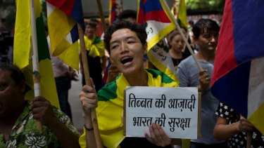Exiled Tibetans show support with India on the Doklam standoff in New Delhi