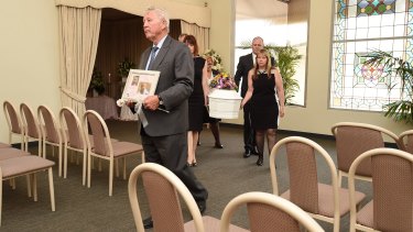 remains pearce elberg suitcase containing coffin funerals adelaide