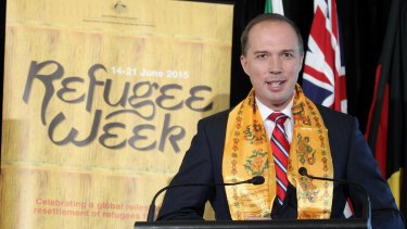 Immigration Minister Peter Dutton delivers his address during the Refugee Week event at Parliament House in Canberra yesterday.