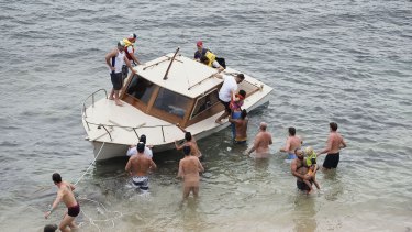 It quickly became apparent that those on board needed help - and luckily, some keen swimmers leapt into action. 