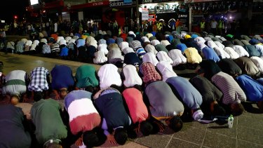 Prayers ... Sydney Muslims gather at a rally to show their support for the Prophet Muhammad in the suburb of Lakemba.