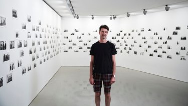 Ross Coulter with his work <i>Audience</i>, 2013-2016, at the NGV's Festival of Photography.