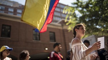 Venezuelan citizens living in the United States vote int he opposition-called ballot in New York.