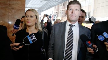 Under pressure: Liberal MP Andrew Cornwell and his wife Samantha Brookes arrive at ICAC.