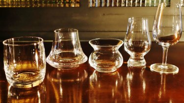 Which glass: (from left) a tumbler, a D&L Whisky Glass, a NEAT Glass, a Glencairn Glass and a copita.