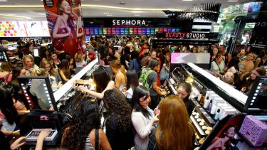 Crowds rushing through the doors of Australia's first Sephora store, which opened in Sydney on Friday.