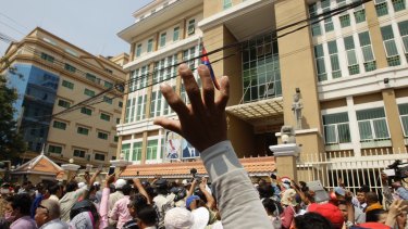 Kim Sok supporters stage a rally against a defamation case filed by PM Hun Sen after the political commentator blamed the government for the murder of political analyst, Kem Ley, last year. 