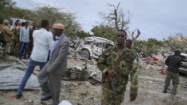 Security forces secure the scene of a suicide car bomb attack in Somalia's capital Mogadishu on Sunday. 
