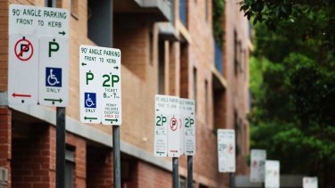 Motorists who use a disabled parking space without a permit can be fined $541 and a demerit point in Sydney compared to $US180 ($234.71) in New York City. 