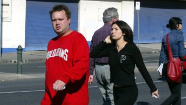 Ms Williams arrives with Carl Williams at the scene of a gangland murder in 2004.