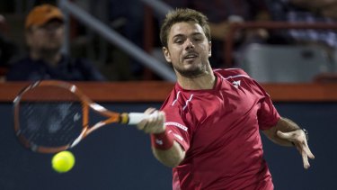 Fiery encounter: Stan Wawrinka returns to Nick Kyrgios at the Rogers Cup.