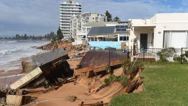 Damaged beachfront homes along Pittwater Road at Collaroy.