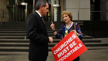 Head of the Catholic Church's  Truth, Justice and Healing Council Francis Sullivan (left) and an abuse survivor Trish Charter (right).