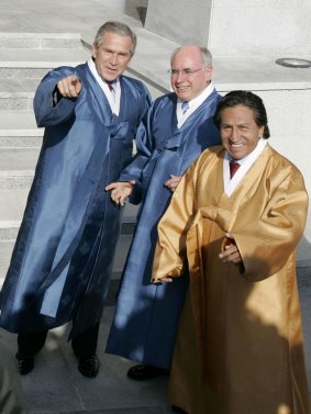 Then Peruvian president Alejandro Toledo wears traditional Korean dress with George W. Bush and John Howard at a 2005 APEC summit in Busan, South Korea.