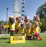 Oxfam activists at a G20 protest in Brisbane.