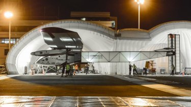 The solar-powered Solar Impulse 2 is only as heavy a family car but has a wingspan as wide as the largest passenger airliner.