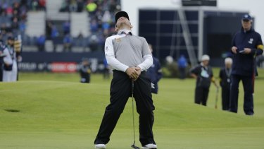South African Louis Oosthuizen reacts after missing a putt on the 17th during the playoff.