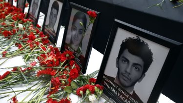 Photographs of victims of the Istanbul attack at a memorial at Ataturk Airport.