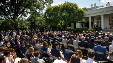 Trump chose a carnival atmosphere for his announcement in the Rose Garden of the White House.