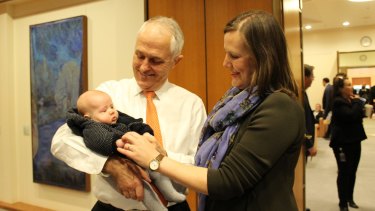 Prime Minister Malcolm Turnbull with Assistant Treasurer Kelly O'Dwyer and her son, Edward.