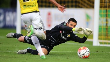 Shot stopper: Paul Izzo saves a goal during the round five A-League match between the Central Coast Mariners and the Wellington Phoenix at Central Coast Stadium.