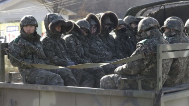 South Korean soldiers ride on a truck in Yeoncheon, south of the demilitarised zone that divides the two Koreas on Friday.