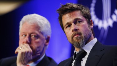 Bill Clinton and Brad Pitt at a panel discussion about rebuilding hurrican-damaged New Orleans. 