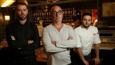 Restaurant owner Tony Cannata , with 457 Visa employees Luigi Conticelli (left) and Nicola Chiocca (right).
