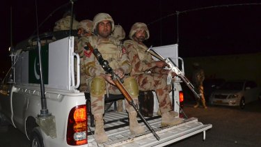 Pakistani troops enter the police academy in response to the terror attack in Baluchistan province.