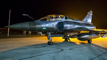 A French army Mirage 2000 jet on the tarmac of an undisclosed air base.