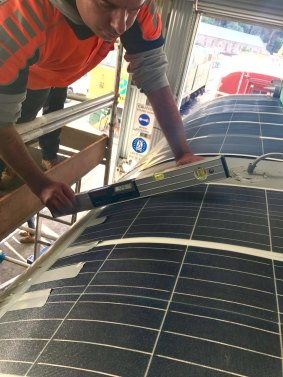 Solar panels being installed on the heritage train.