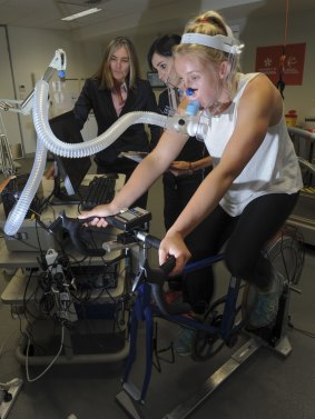 New level: Canberra Capitals coach Carrie Graf in the physiology lab with Phd student, Kristy Martin. 