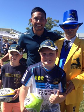 Brumbies player Christian Lealiifano with Brumbies Man aka Trevor Hancock and Brumbies Boy (middle) aka Joshua Hancock and younger brother Ben Hancock.  The family say Christian is a special player on and off the field.