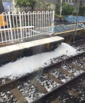 Hail piled up at Taringa Railway Station in Brisbane. 