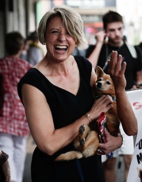 Kristina Keneally meets Sydney identity Danny Lim and his dog at the Epping pre-poll booth.