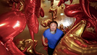 Ai Weiwei visits his Caonima Balloon installation, part of the NGV's Andy Warhol / Ai Weiwei exhibition.