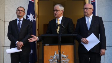 Prime Minister Malcolm Turnbull and Attorney-General George Brandis at last week's announcement naming Brian Martin as the commissioner.