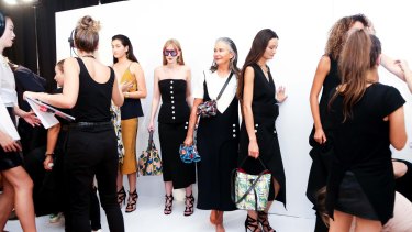 Model Lou Kenny (centre), pictured backstage, starred in the Vogue Runway at the Melbourne Fashion Festival on Wednesday night.