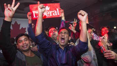 Supporters of Justin Trudeau celebrate as results come in on election night in Montreal, Quebec.
